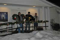 carolers on church steps