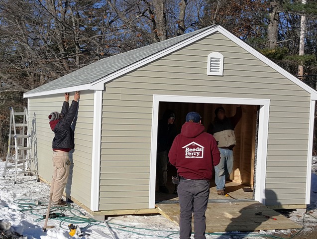 men working on shed