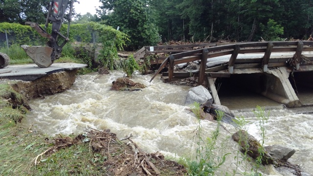 water rushing over bridge