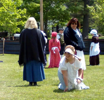 students learning colonial games