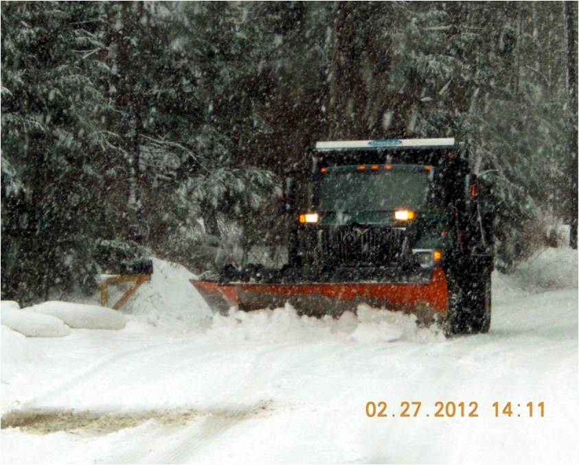 Snowplow in storm