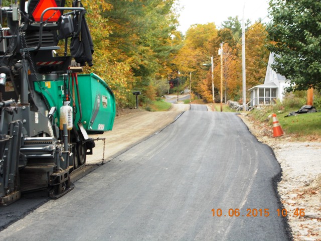 applying pavement to Codfish Hill Rd