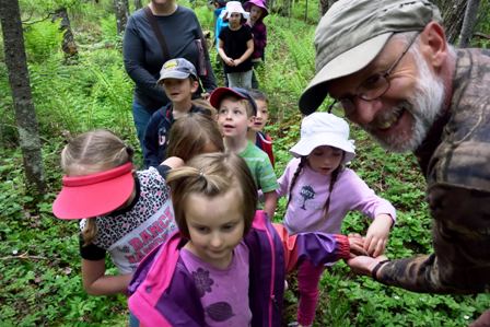 line of children hiking