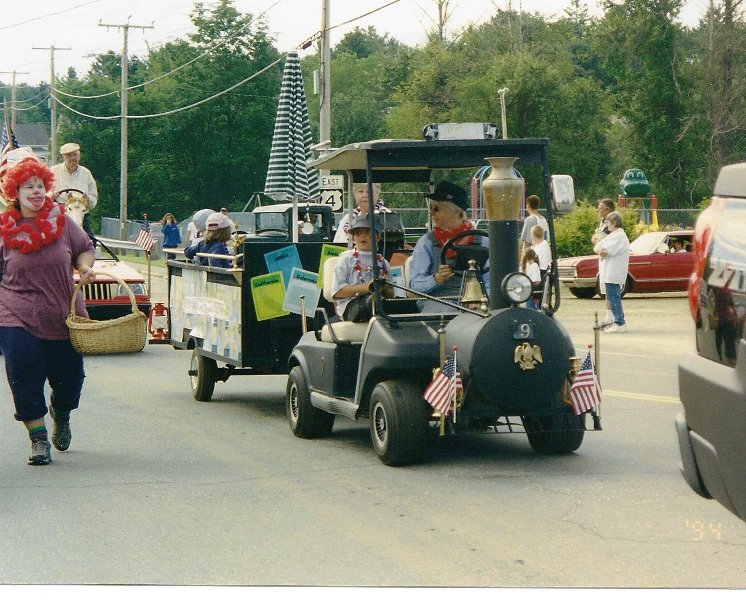 golf cart made into a train float