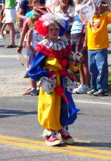 child dressed as clown