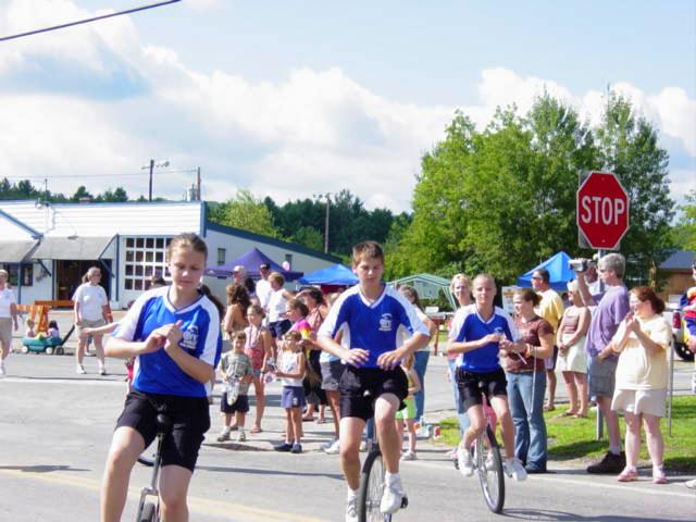 children on unicycles