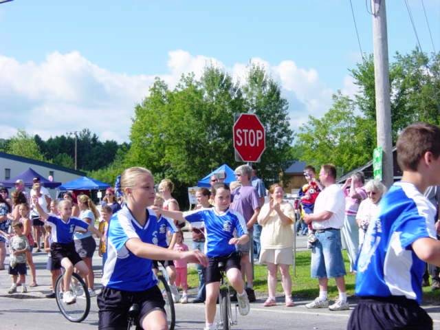 children on unicycles