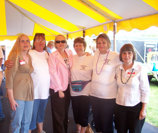 a group of alumni posing for a photo