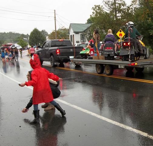 parade audience collecting candy