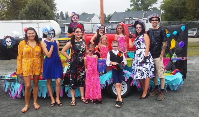 participants in the Day of the Dead float