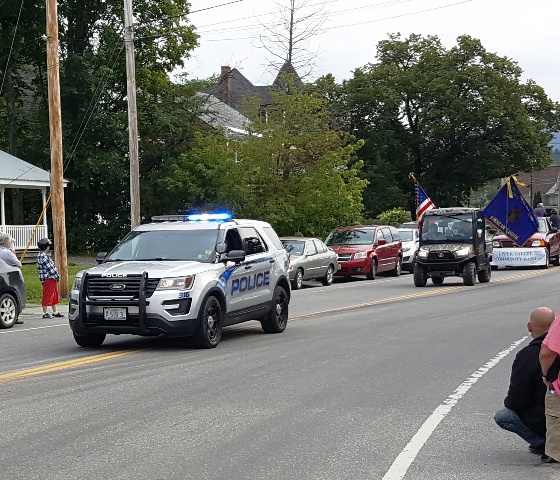 police car leading parade